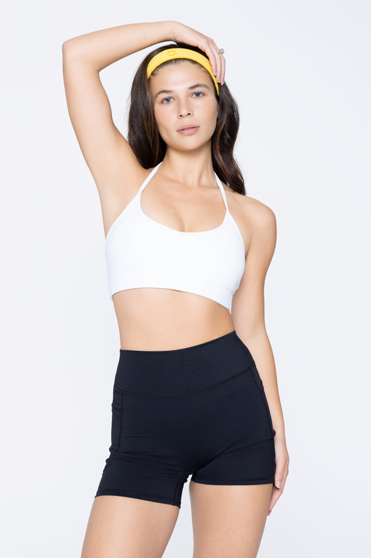 Front shot of model wearing Ruay Muse Prima sports bra