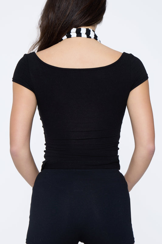 Back shot of model wearing Ruay Muse Aire drape top