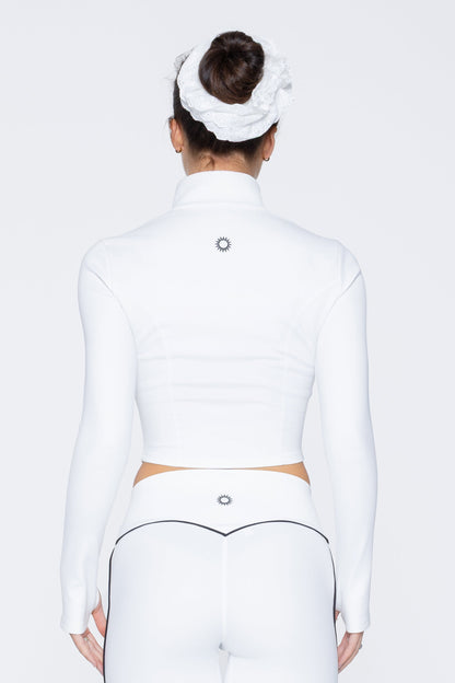 Back shot of model wearing Ruay Muse Axis jacket