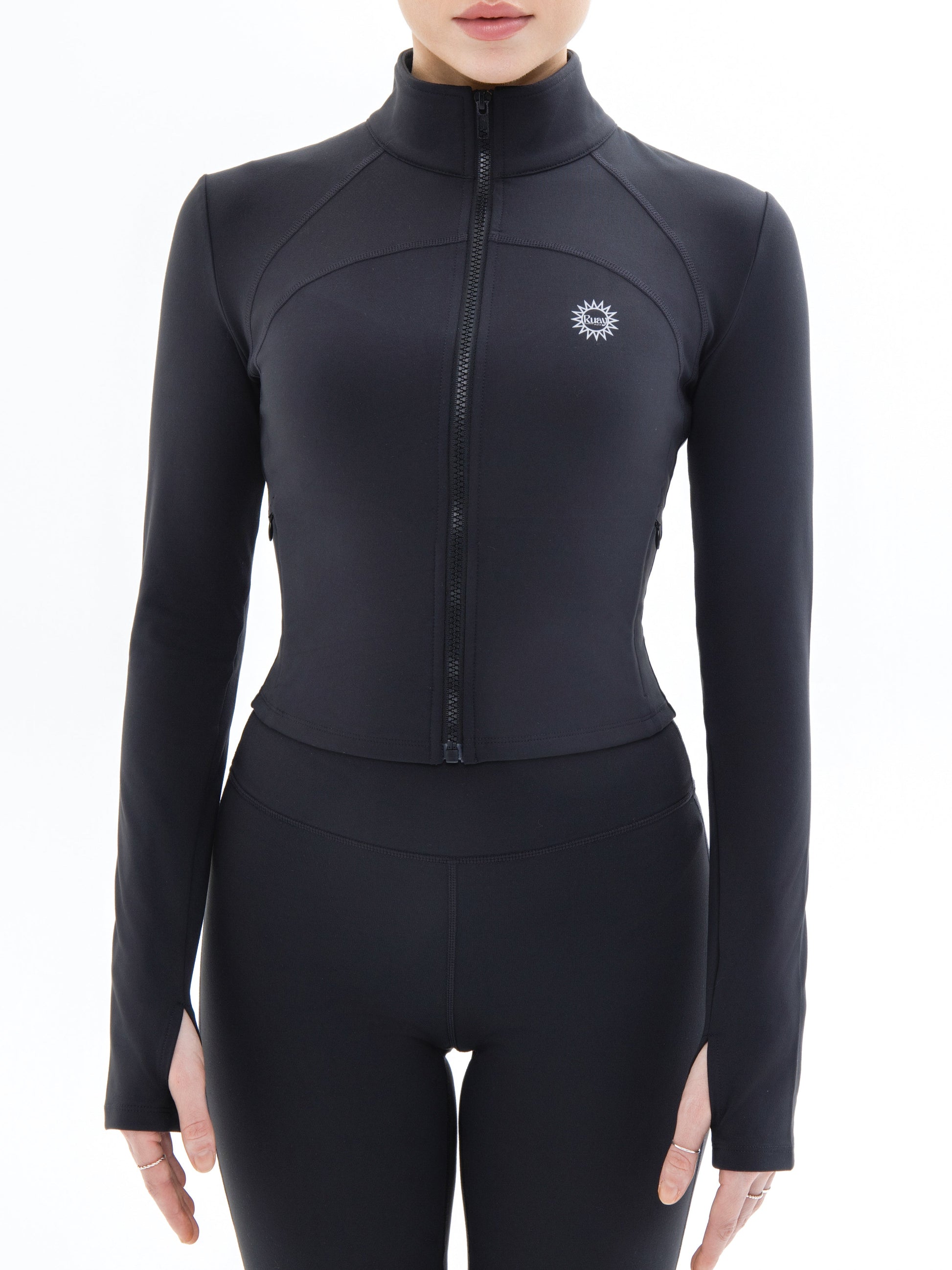Front shot of model wearing Ruay Muse Silhouet jacket