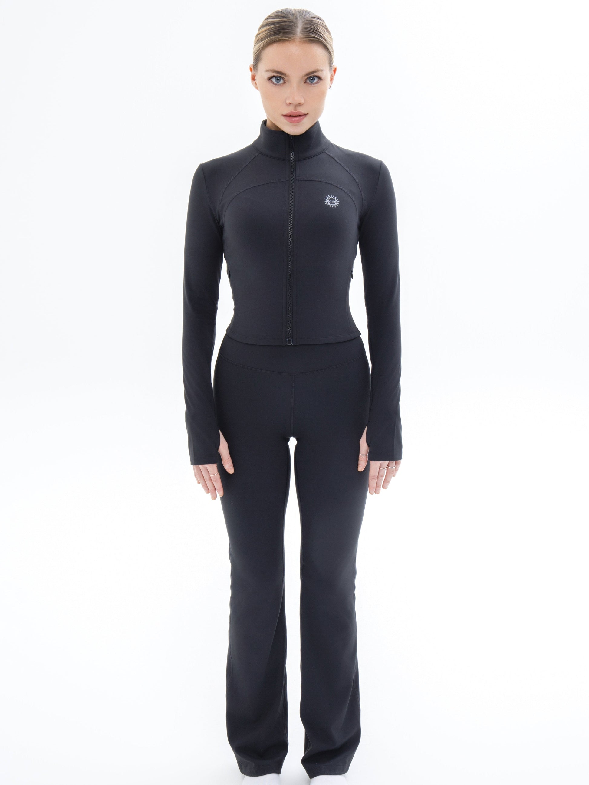 Front shot of model wearing Ruay Muse Silhouet jacket and trousers