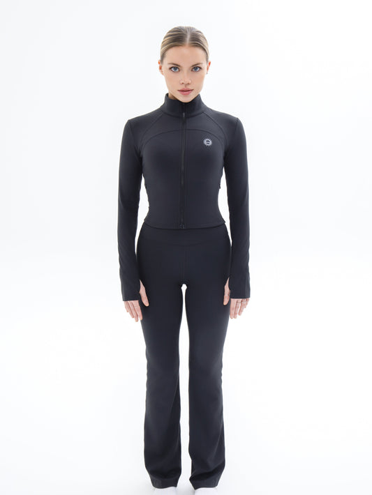 Front shot of model wearing Ruay Muse Silhouet jacket and trousers